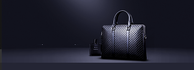 高档简约商务男包黑色背景海报背景