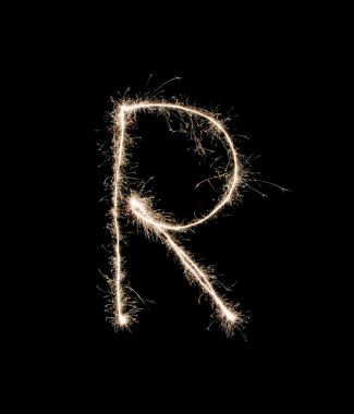 在黑色背景上的字母 R图片