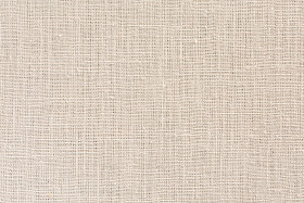 中性米色织物背景与明确的画布纹理