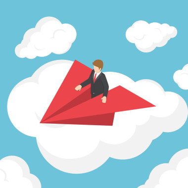 等距商人在云端的纸飞机图片