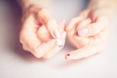 People concept - close-up of female finger blood drops and T