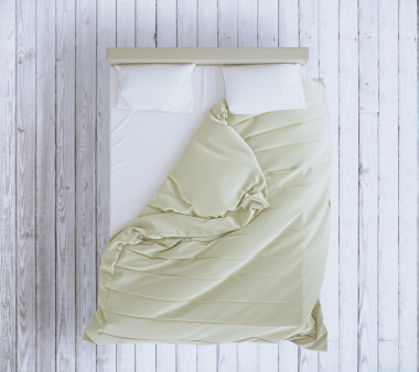 灰色地板上的未铺床