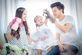 The concept of family, children and family - smiling parents and small