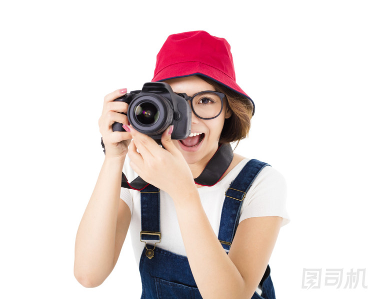 幸福的年輕女人拍照相機(jī)