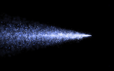 抽象的粒子蓝色闪闪发光恒星的尘埃痕迹