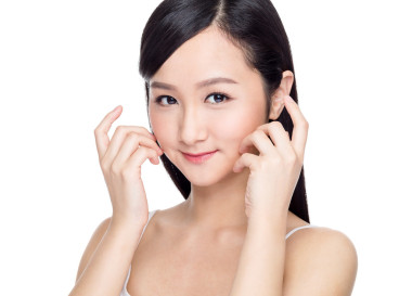 亞裔女子和完美的肌膚 