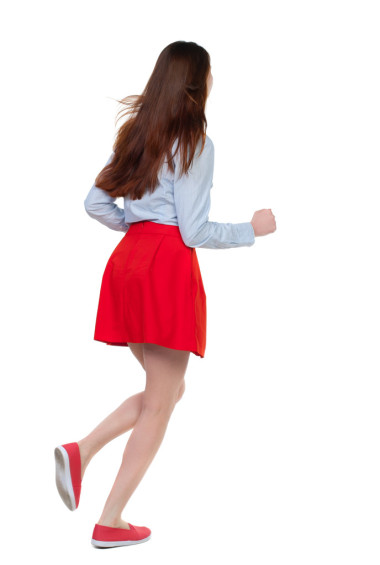 正在運(yùn)行的女人的側(cè)視圖.照片