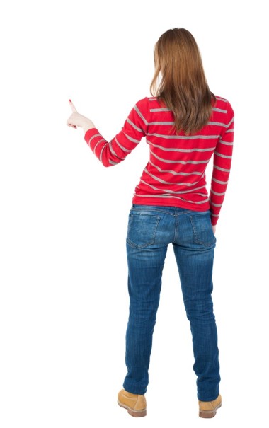 后視圖的指點的女人.圖片