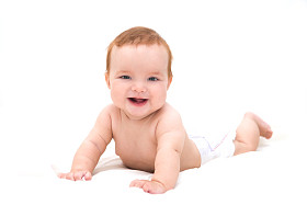 有趣的小宝宝躺在毯子上。新生婴儿躺床上休息。青少年儿童的的幼儿园。纺织和床上的用品为孩子