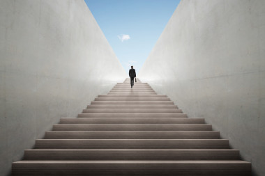 野心概念与商人爬楼梯