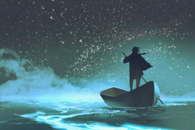 美麗的天空，繁星下的大海里劃船的人