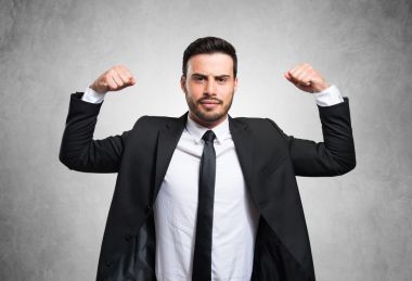 强大的商人上灰色孤立图片