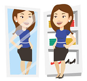 试衣服在更衣室里的女人.图片