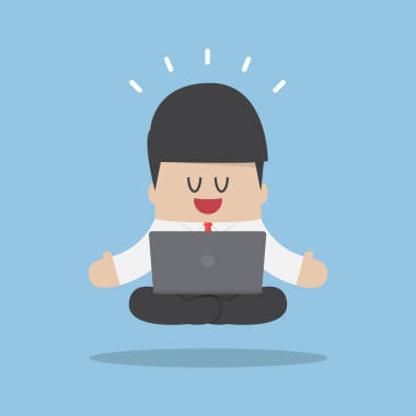 冥想時使用筆記本電腦的商人圖片