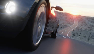 路上，黑色跑車公路。非?？扉_車。3d 渲染