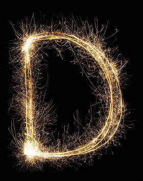 在黑色背景上的烟火字母表中的字母的英语字母 D