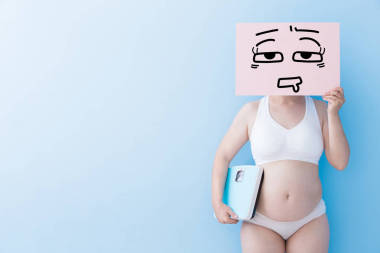 胖女人帶累了的廣告牌圖片