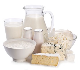 在白色背景上乳制品.图片
