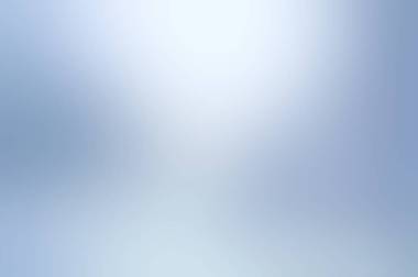 淡蓝色的银喜庆纹理。抽象的圣诞背景。眩光光辉节日纹理