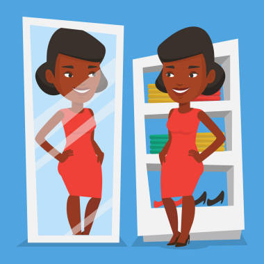 試衣服在更衣室里的女人