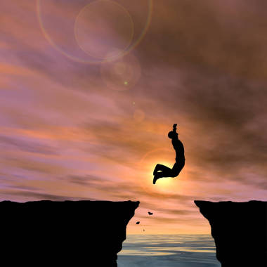 跳跃的商人剪影的插图图片