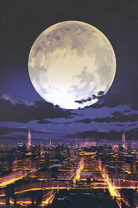 满月在夜间城市天际线的夜景图片