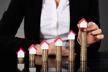 女商人排房子模型圖片