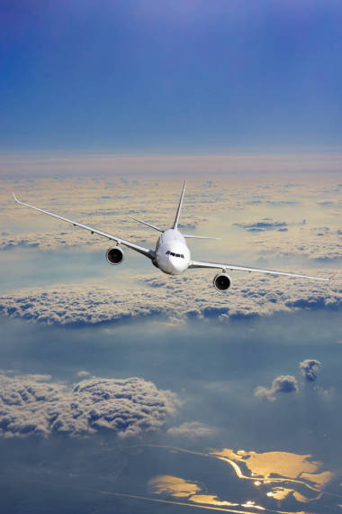 飛機(jī)在天空中的飛機(jī)?？蜋C(jī) 圖片