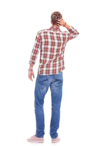 困惑的年輕人休閑圖片