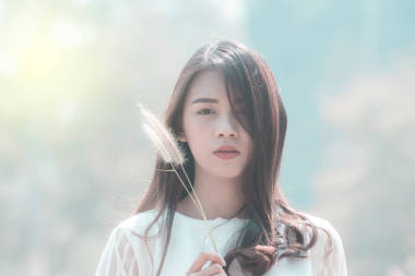 微笑亞洲婦女肖像圖片