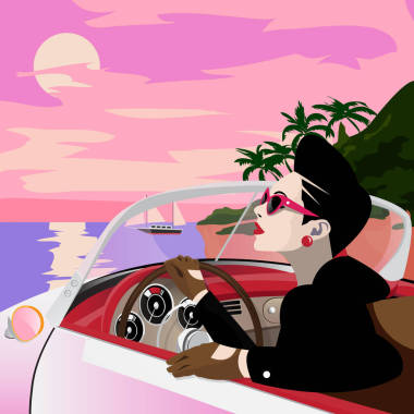 时髦的女士驾驶复古车