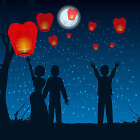 让人剪影天灯向天空图片