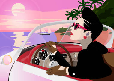 時髦的女士駕駛復古車.照片