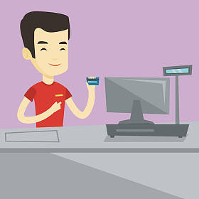 收银员结账时持有信用卡.图片