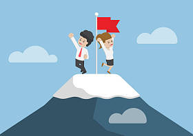 爬到山顶的商人图片