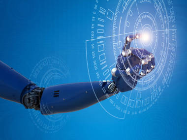 機(jī)器人手和虛擬圖形一起工作圖片