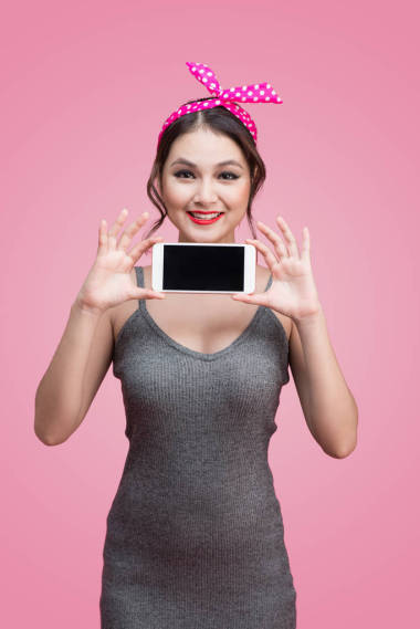 拥有移动电话的妇女 图片