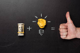 灯泡符号和大拇指照片