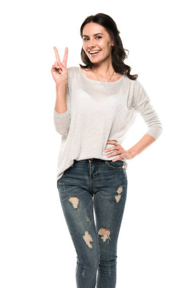 女人用勝利的手勢圖片