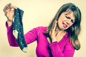 Her husband -- a woman with stinky socks in a retro style