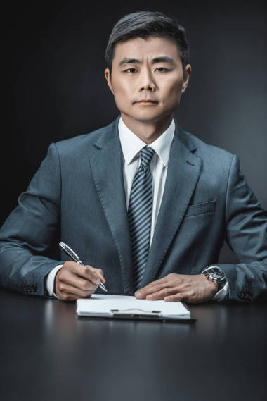 亞洲商人與文檔圖片