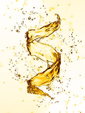 水溅在螺旋黄金色的形式图片