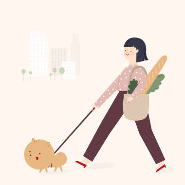 遛狗在一個城市中的女孩