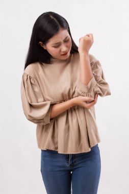 女人患肘關節(jié)痛、 類風濕或痛風 arthriis