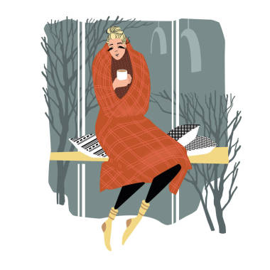 一個女孩靠近窗邊喝杯.照片