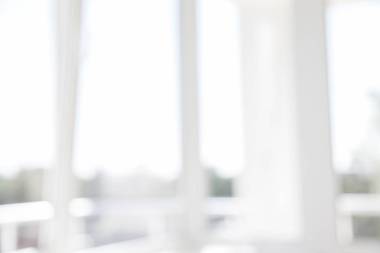 模糊辦公室背景建筑外部視圖到大堂玻璃窗口