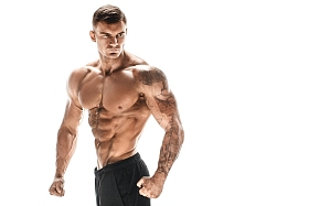 肌肉超高水平英俊的男人在白色背景上摆姿势