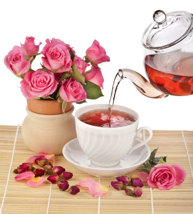 玫瑰花束的茶杯子照片