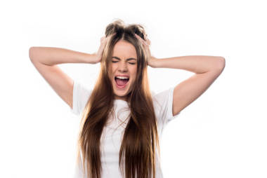 女孩尖叫和觸碰的頭用手圖片