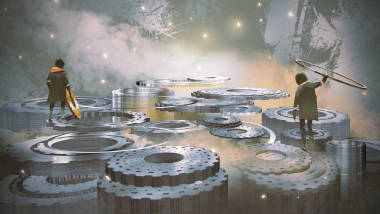 两个男孩修大齿轮照片